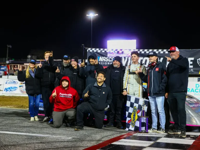 Matthew with team in victory lane